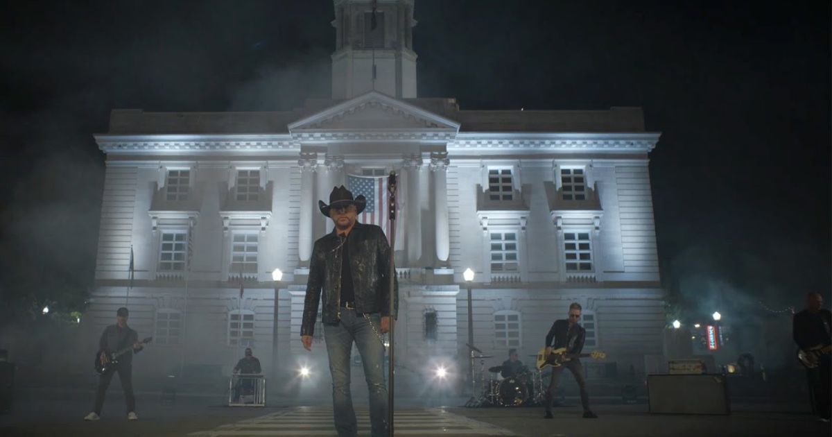 Jason Aldean stands while shooting the new music video for his song “Try That in a Small Town.”