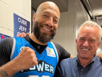 Democratic presidential candidate Robert F. Kennedy Jr. is seen with former professional basketball player Royce White.