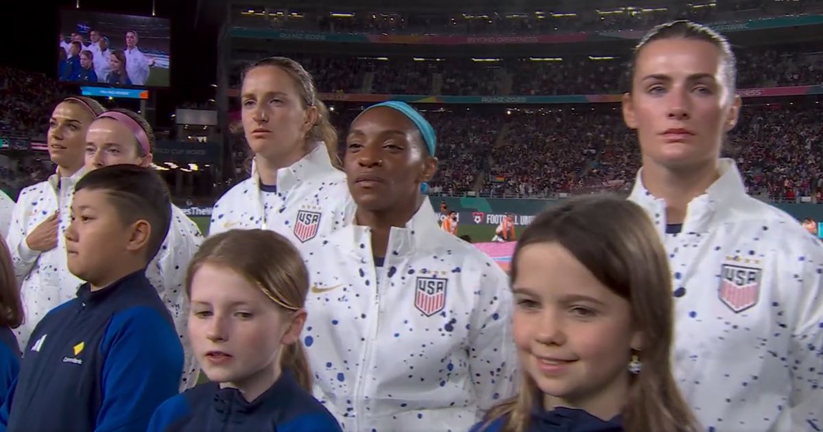 The U.S. women's national soccer team stands in line during the National Anthem before their World Cup game against Portugal on Tuesday.