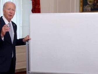 President Joe Biden stands in front of a whiteboard in a video released by the White House last week.