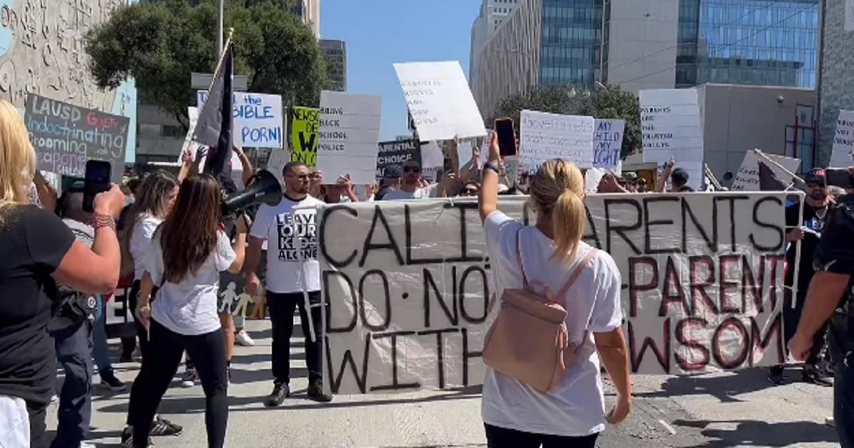 A parents rights group protests Tuesday outside the headquarters of the Los Angeles Unified School District.