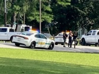 The scene outside a home in Henderson, Tennesee, where a man was shot to death during an Aug. 16 police raid.