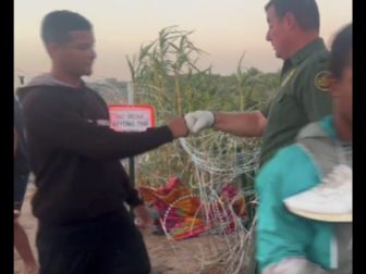 A U.S. Border Patrol agent fist-bumped an illegal migrant after letting him into the country on Thursday.