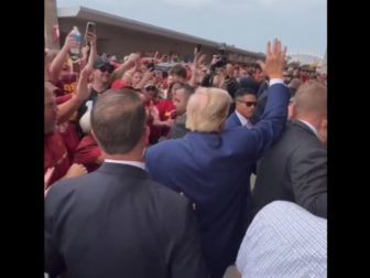 Former President Donald Trump arrives at Jack Trice Stadium for a football game between the University of Iowa and Iowa State University on Saturday.