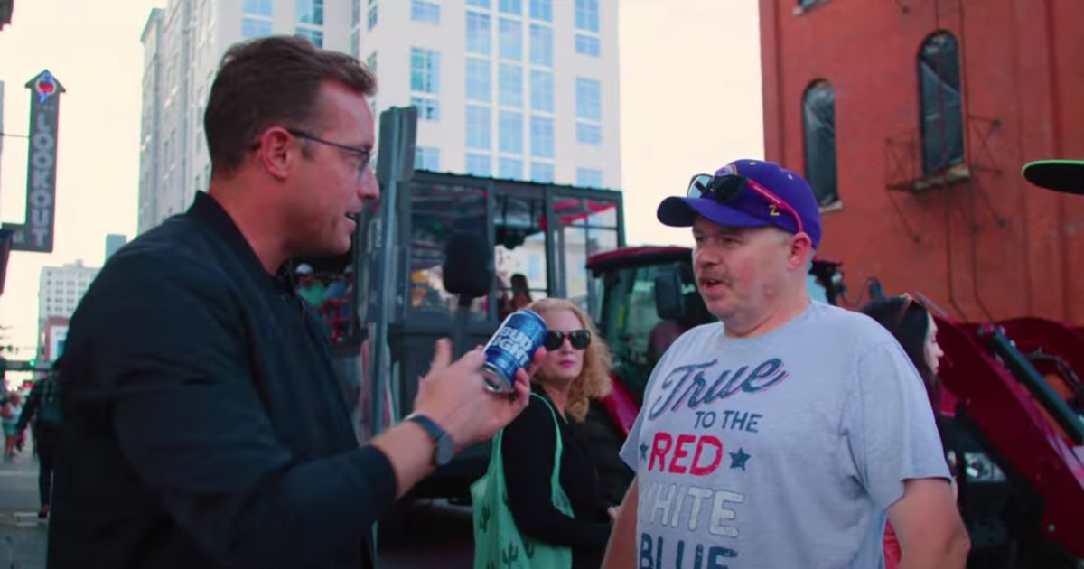 Benny Johnson stood on Broadway Street in Nashville, offering free Bud Lights to people on the street, but no one wanted to accept the free beverage.