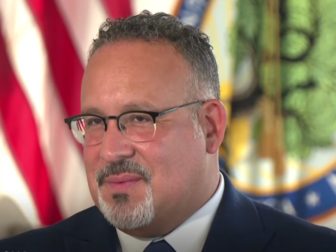 Education Secretary Miguel Cardona speaks to the Associated Press on Friday.