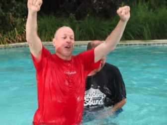 Hall of Fame football player Jim Kelly was baptized.