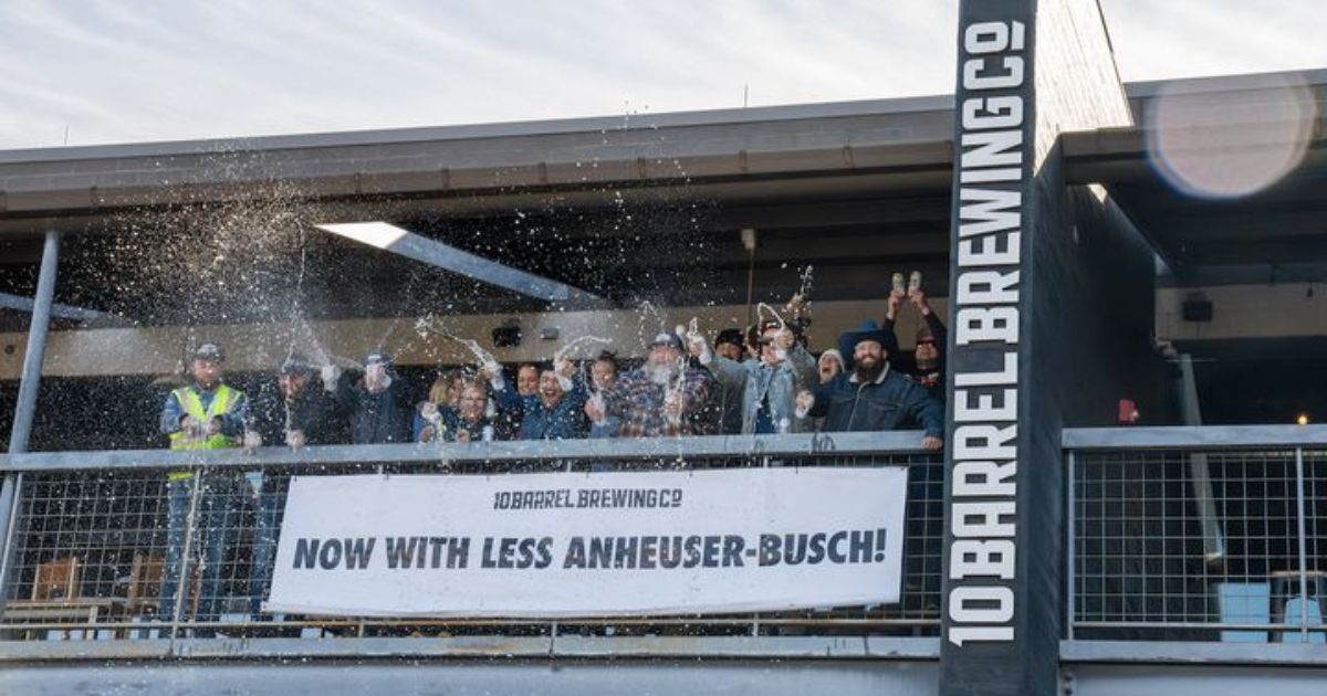 Employees of 10 Barrel Brewing in Oregon celebrate new ownership.