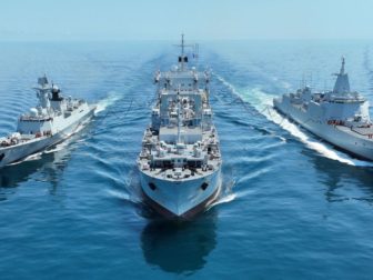 Warships attached to a combat support ship flotilla of the Chinese navy steam in formation during a comprehensive replenishment training exercise on Sept. 22.