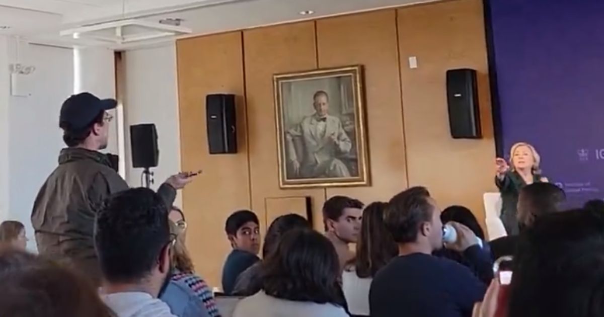 A man heckles Hillary Clinton during an event at Columbia University in New York City.