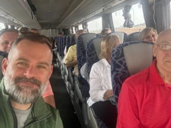 Rep. Cory Mills, a Florida Republican, is pictured with Americans getting out of Israel after the surprise Hamas attack on Saturday ignited war.