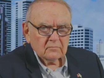 Business billioniare Leon Cooperman glowers while being interviewed by Fox Business host Liz Claman on Wednesday. (Claman is not pictured.)