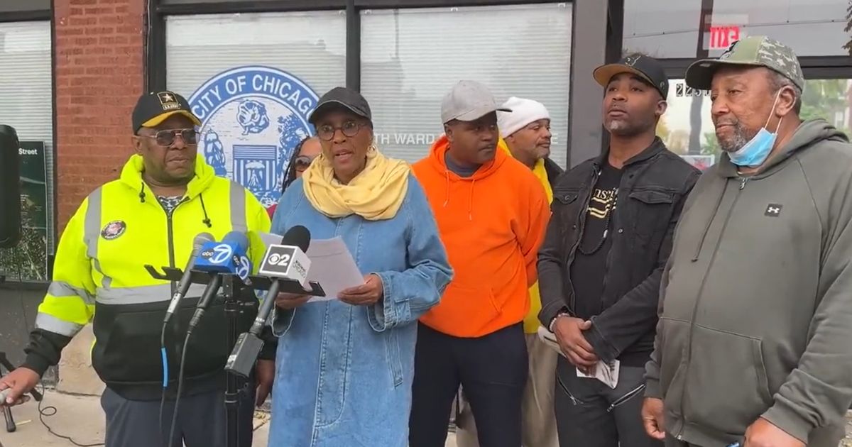 Chicago protesters read their demands to city officials.