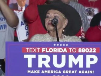 Roseanne Barr speaking to the crowd at a Trump rally