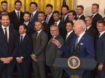 President Joe Biden talks to some clearly puzzled players for the Vegas Golden Knights NHL hockey team at the White House on Monday.