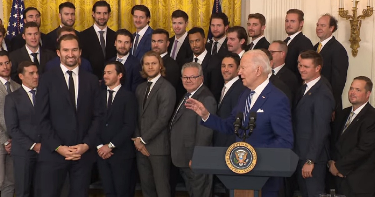 President Joe Biden talks to some clearly puzzled players for the Vegas Golden Knights NHL hockey team at the White House on Monday.