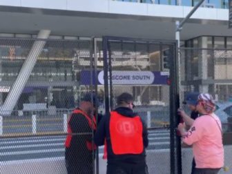 San Francisco police install a security fence around the Moscone Center.