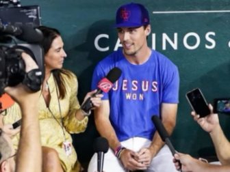 Texas Rangers left fielder Evan Carter is selling a T-shirt that says "Jesus Won."