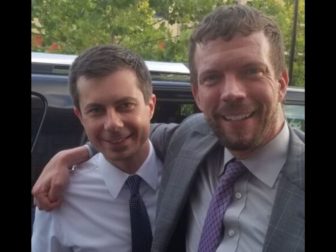 A former mayor of Patrick Wojahn, right, is seen with Secretary of Transportation Pete Buttigieg.