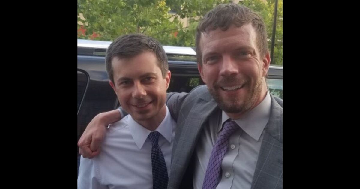 A former mayor of Patrick Wojahn, right, is seen with Secretary of Transportation Pete Buttigieg.