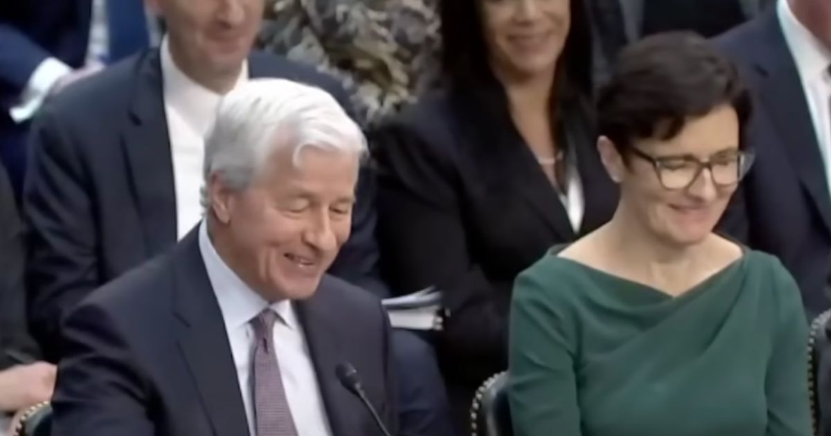 During a Wednesday Senate Banking Committee Hearing, Sen. John Kennedy made a joke referencing Alec Baldwin, causing JP Morgan Chase CEO Jamie Dimon, left, to laugh.