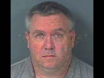 Michael David Foster has been charged with 32 counts of possession of child pornography.