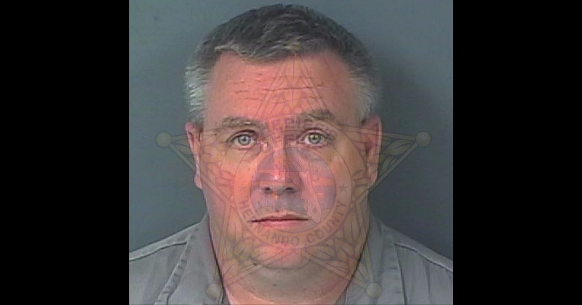 Michael David Foster has been charged with 32 counts of possession of child pornography.