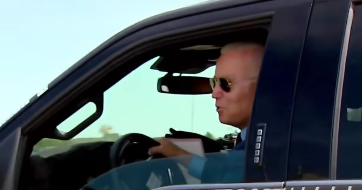 President Joe Biden is seen in a Ford electric F-150.