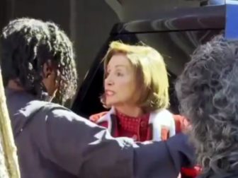 Former Speaker of the House Nancy Pelosi confronted protesters outside her home in San Francisco on Monday, telling them to "go back to China."