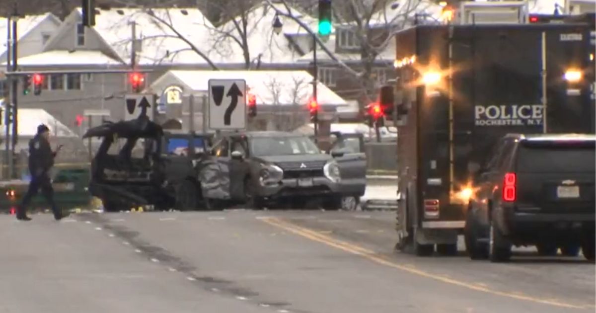 Police work the scene of the crash in Rochester, New York.