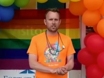 Sean Gravells speaking during a Pride event