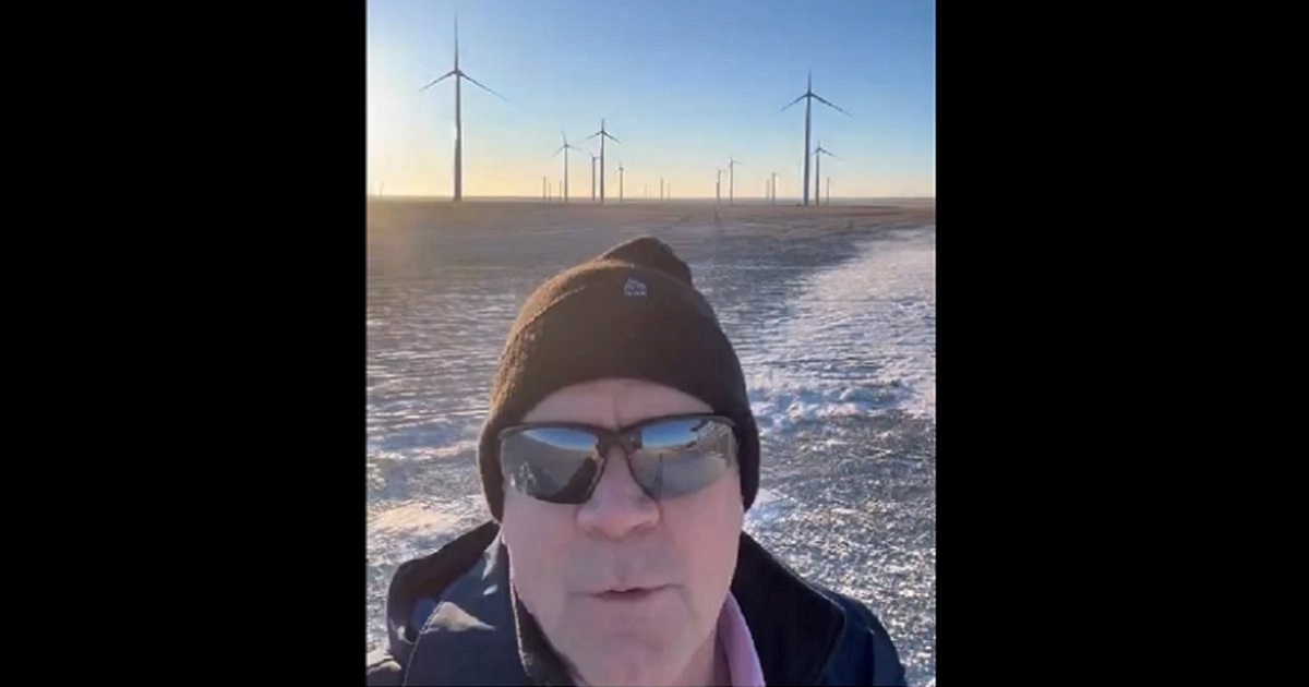 Republican Rep. Matt Rosendale in a still from a video of a visit to a wind turbine facility where none of the turbines are spinning.