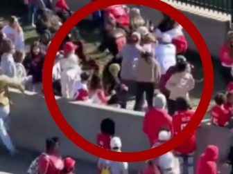 New video footage appears to show Kansas City Chiefs fans chasing down a suspect following a shooting at the end of the Super Bowl parade in Kansas City, Missouri, on Wednesday.