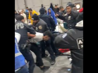 NYPD officers are attacked by immigrants at the city's Randall's Island shelter.