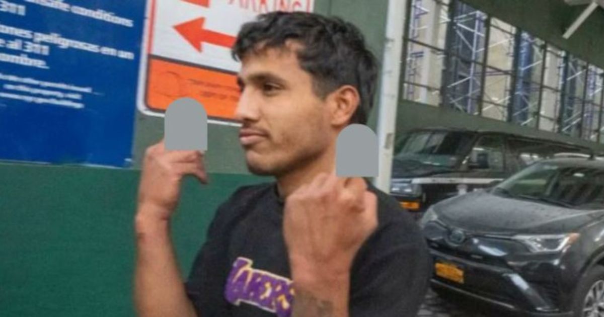 Jhoan Boada, one of the men suspected of attacking two NYPD officers in Times Square, "saluted" onlookers upon leaving court on Jan. 31. The charges against him have since been dropped.