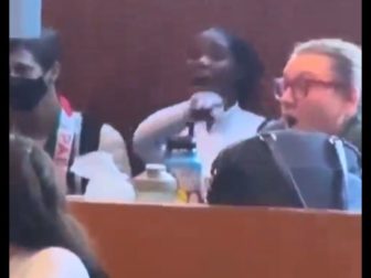 A woman identified as Loyola Marymount University graduate student Grace Obi-Azuike yells at Jewish people.