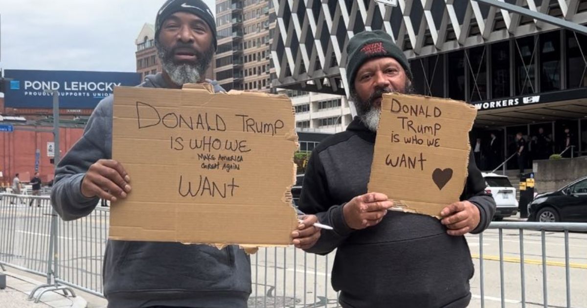 People gather to greet President Joe Biden in Pittsburgh on Wednesday.