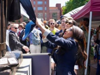Rep. Lauren Boebert tries to remove a Palestinian flag covering a statue of George Washington at George Washington University in D.C.