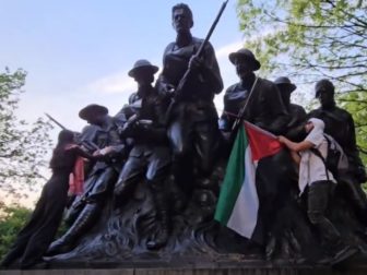 Anti-Israel protesters deface the 107th Infantry Memorial in New York's Central Park on Monday.
