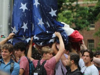 On Tuesday, a group of UNC student, identified as members of fraternities, stood together to hold up the American flag for an hour while anti-Israel protesters attempting to take down the flag and threw bottles, water, and rocks at them and hurled insults.